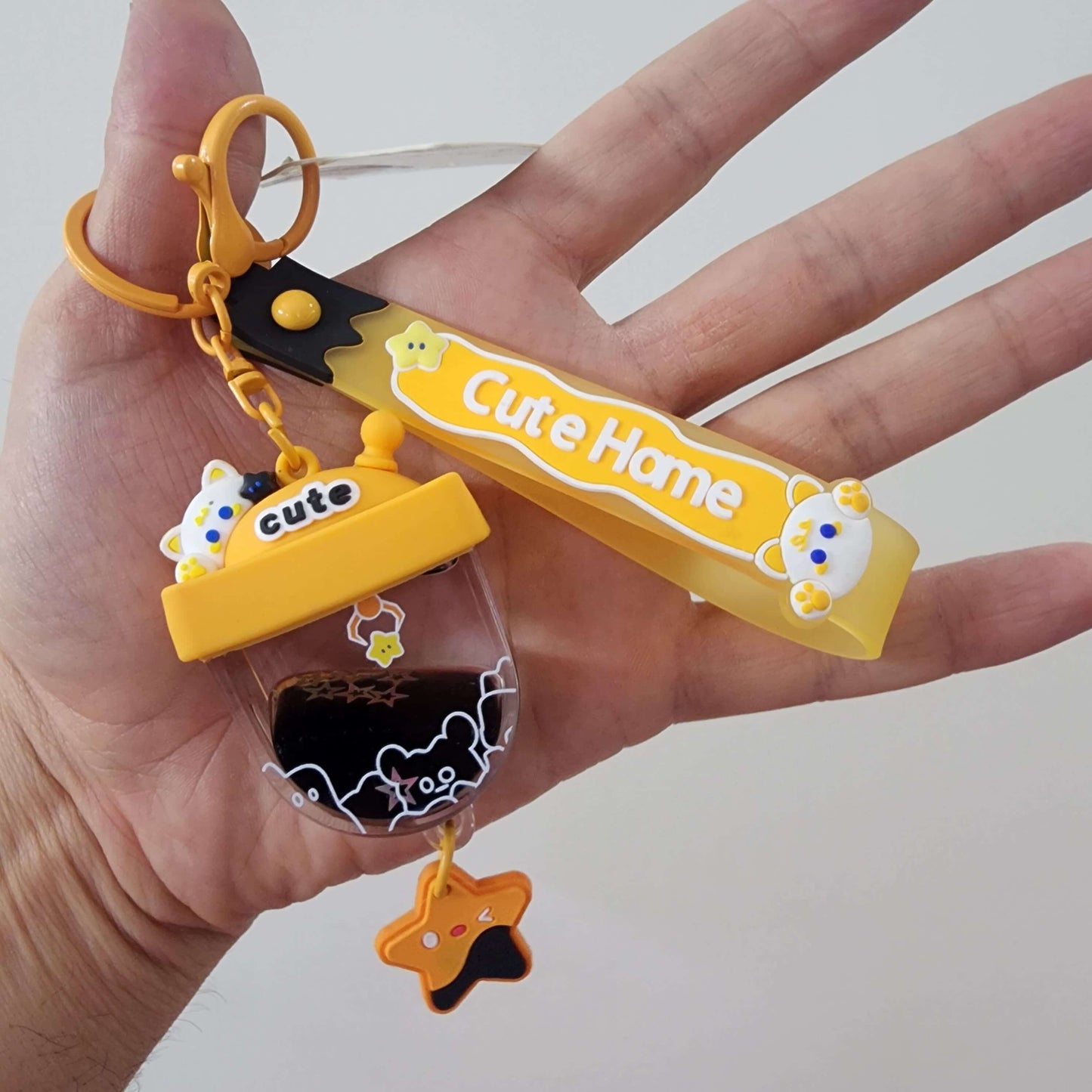 Cute key ring with character design, colorful charm, and tag, perfect for adding flair to your keys.