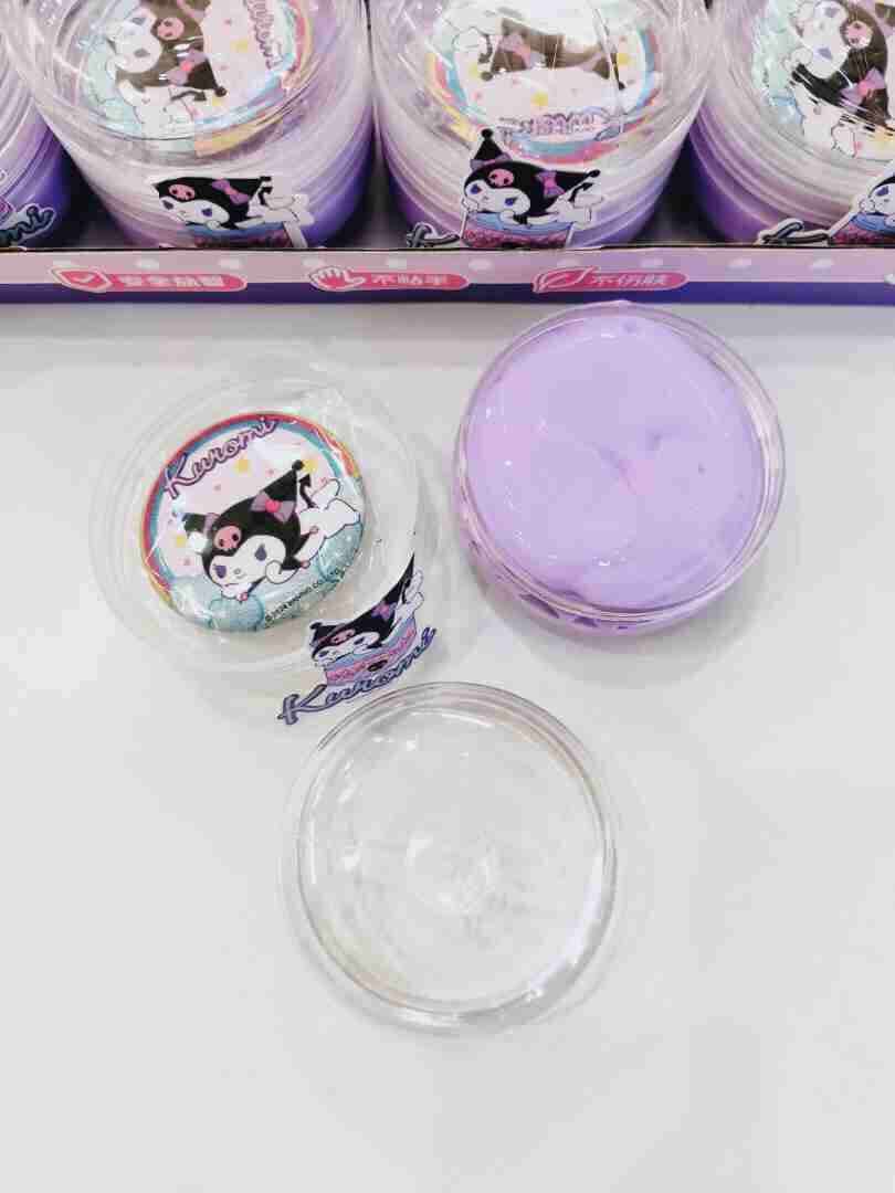 KUROMI SLIME in clear containers, featuring a fun key ring badge, showcasing purple and colored slime varieties.