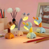 Colorful cute night lamps in whimsical shapes casting warm light, perfect for cozy bedroom ambiance.