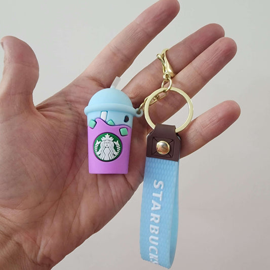 Colorful key ring with Starbucks cup charm and blue wrist strap, perfect for organizing keys.