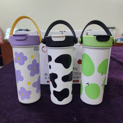 Portable insulated stainless steel Travel mug / Coffee mug with a handle / Dual mouth ,featuring various decorative patterns like cow print, flowers, and fruits [ 610 ml ]