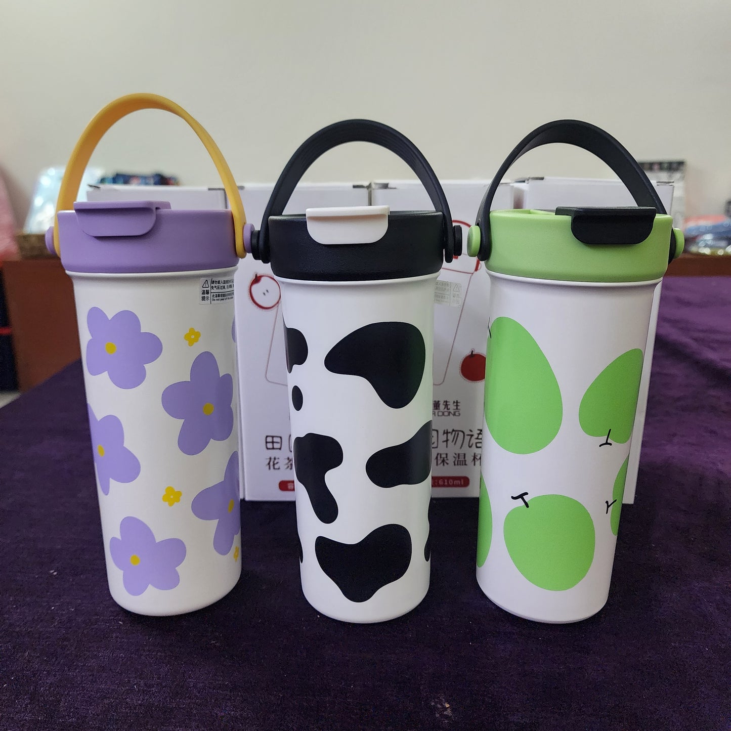 Portable insulated stainless steel Travel mug / Coffee mug with a handle / Dual mouth ,featuring various decorative patterns like cow print, flowers, and fruits [ 610 ml ]